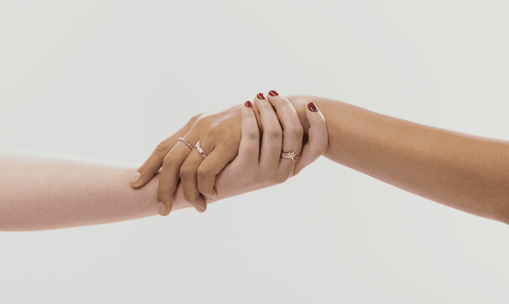 Hands clasped together